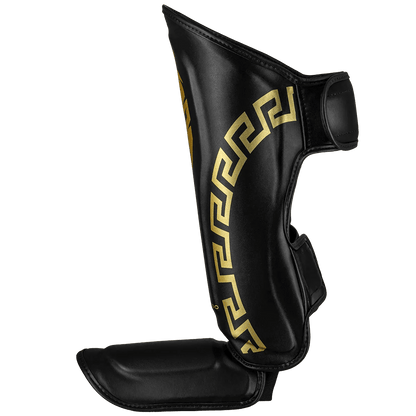 Caneleira de Muay Thai Legendary Preto e Dourado