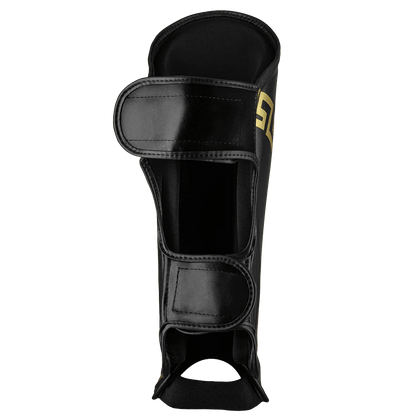 Caneleira de Muay Thai Legendary Preto e Dourado
